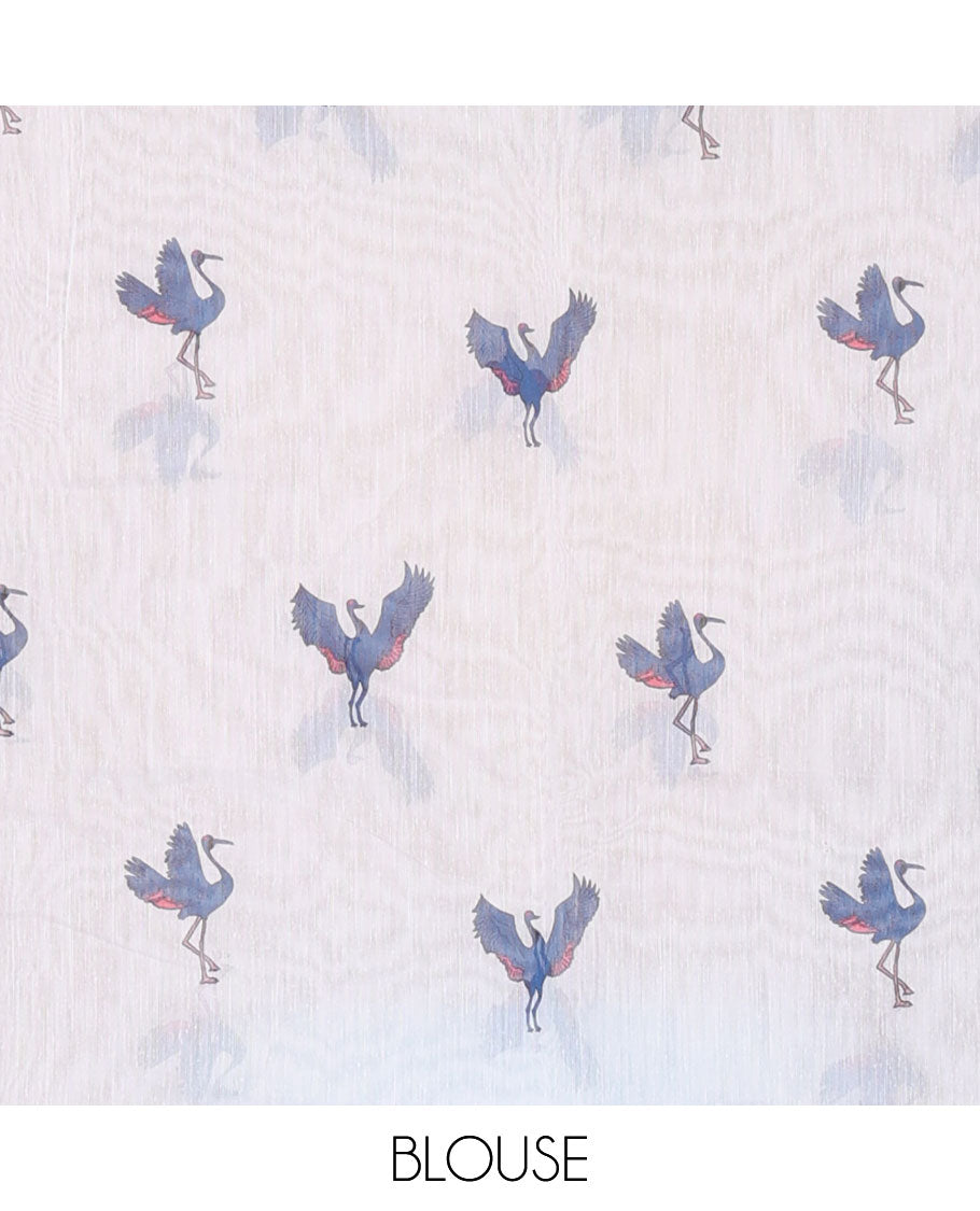 Borderless blue crane motifs printed linen cotton saree, crane motifs printed pallu, and a contrast crane printed blouse
