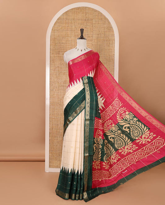Cream zari buttas enclosed checked dola silk saree, contrast ganga jamuna temple peacock motifs border, floral-paisley printed pallu & contrast zari design blouse
