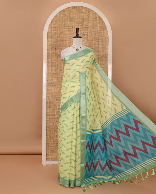 Lemon yellow ikkat digitally printed linen saree, contrast zari bavanji border,chevron ikkat printed pallu & ikkat jaal printed contrast blouse