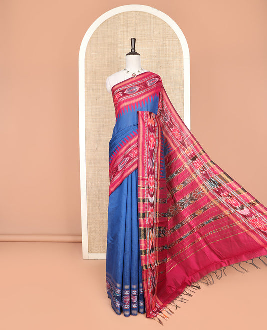 Blue Plain Dupion Silk Saree, Embellished with a Contrast Temple Border of Geometric Patterns and Ikkat Weave, Pallu Depicting Floral Ikkat Designs, and Paired with a Contrast Blouse