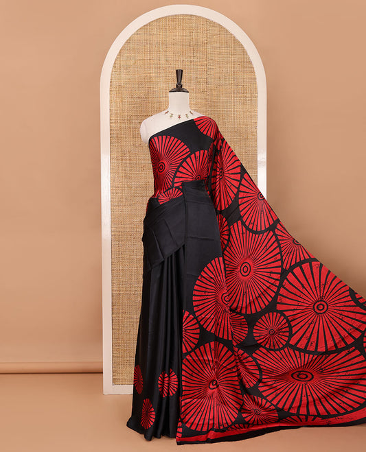 Borderless black-red sunburst motifs batik-style printed gajji silk saree, plain black blouse