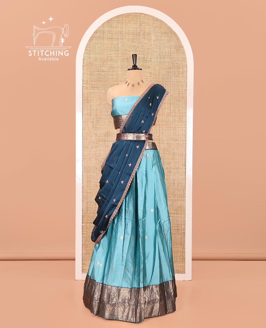 Sea Green and Blue Semi-Banarasi Half-Saree, Elevated with Zari Buttas on Its Skirt, Complemented by a Contrast Traditional Zari-Design Border, Paired with a Matching Blouse, and a Contrast Satin Georgette Zari-Bordered Dhavani