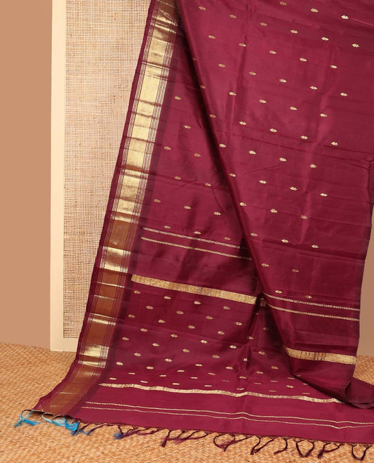 Maroon buttas kancheepuram silk saree with contrast intricate zari design border & floral zari design pallu