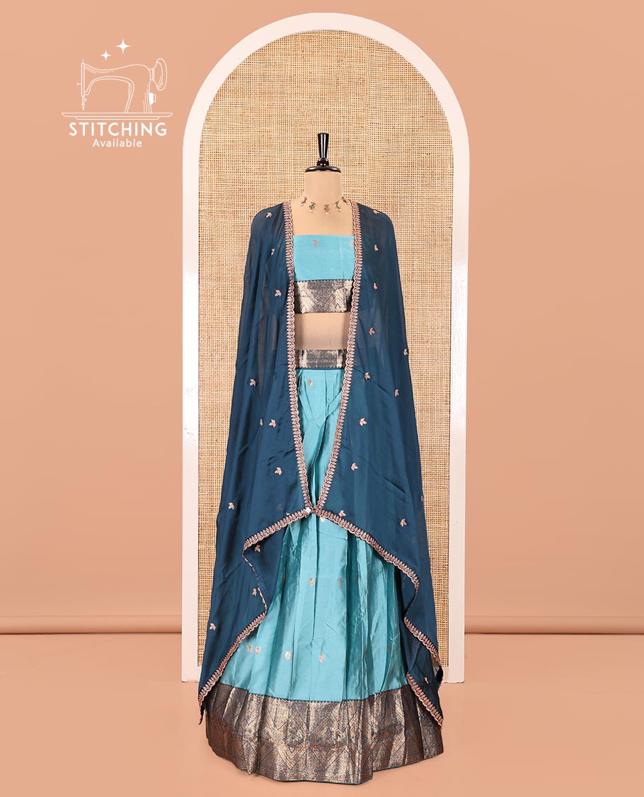 Sea Green and Blue Semi-Banarasi Half-Saree, Elevated with Zari Buttas on Its Skirt, Complemented by a Contrast Traditional Zari-Design Border, Paired with a Matching Blouse, and a Contrast Satin Georgette Zari-Bordered Dhavani