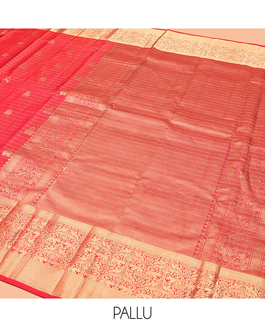 Red Vasundhara Silk Saree, Elegantly Highlighted with Zari Buttas, Highlighted by a Vanasingaram-Style Zari Vanki Border, Jaal Pallu, and a Matching Blouse