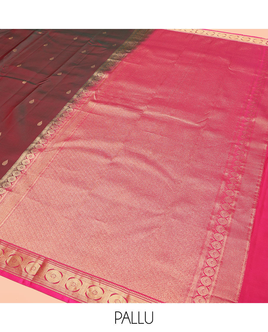 Red Wine Kanchipuram Silk Saree, Adorned with Thilakam Buttas All Over Its Body, Complemented by a Contrast Border of Rekku, Muthu, Banaras, Mayil, and Chakram Designs, Grand Jaal Pallu, and Paired with a Contrast Blouse