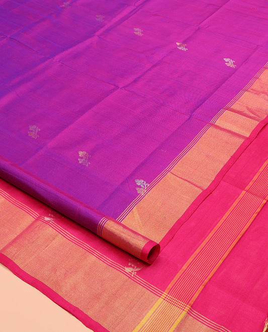 Rani Pink Uppada Silk Saree, Prettified with Zari Buttas All Over Its Body, Complemented by a Contrast Bavanji Border, Pallu Steeped with Zari Buttas, and Paired with a Contrast Blouse