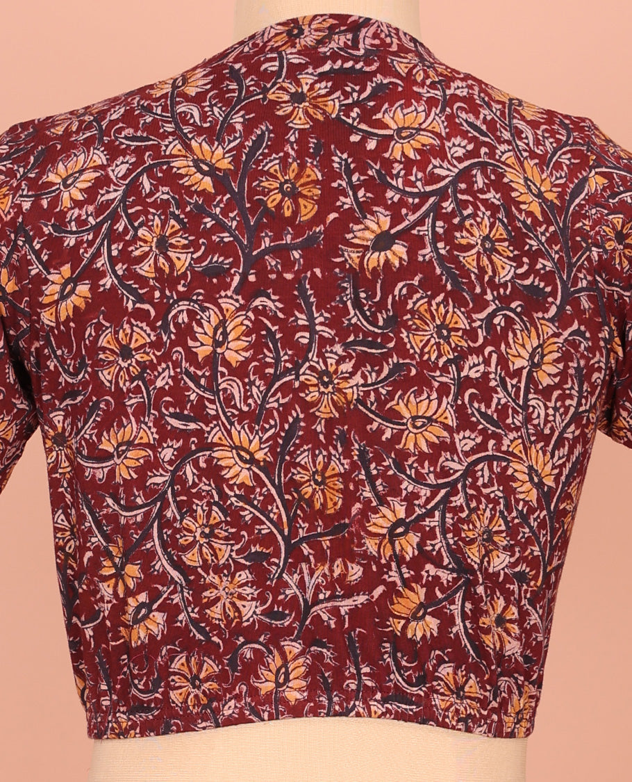 Maroon Cotton Readymade Blouse Embellished with All-Over Kalamkari Floral Vine Print, Front V-Neck, Back Closed Neck, and Elbow Sleeves