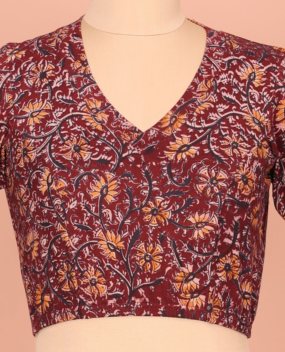 Maroon Cotton Readymade Blouse Embellished with All-Over Kalamkari Floral Vine Print, Front V-Neck, Back Closed Neck, and Elbow Sleeves