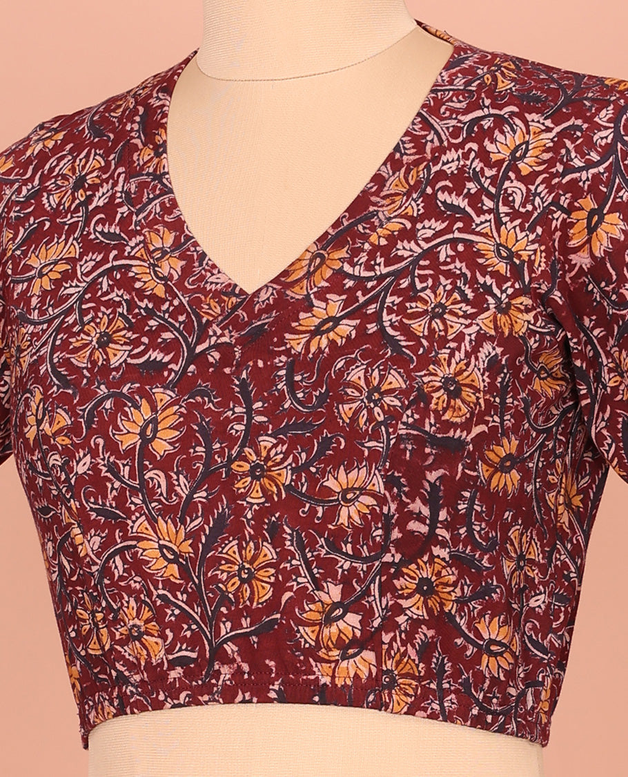Maroon Cotton Readymade Blouse Embellished with All-Over Kalamkari Floral Vine Print, Front V-Neck, Back Closed Neck, and Elbow Sleeves