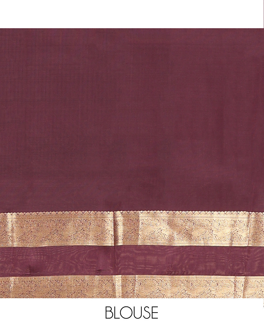 Orange zari buttas and stripes Vasundhara silk mix saree, contrast rettai pettu border of muthu, yaali, and chakram designs, and intricate pallu