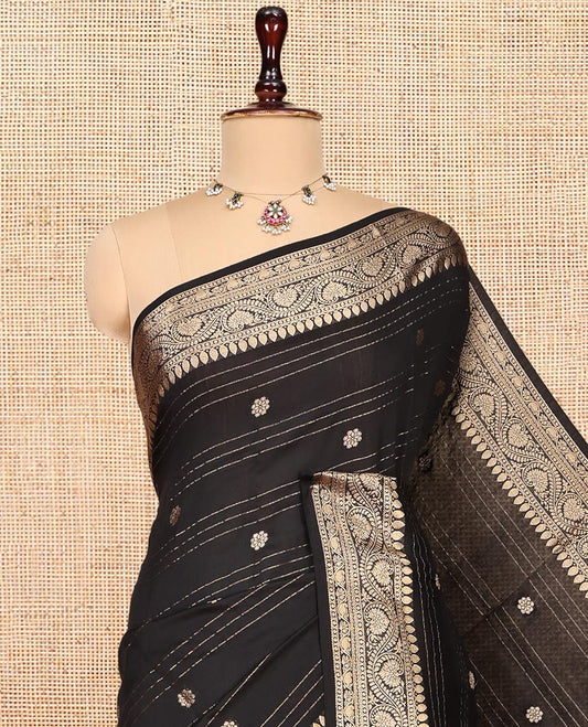 Black Assam Silk Saree, Uniquely Detailed with Zari Buttas and Stripes, Highlighted by a Zari Traditional Woven Border, Zari-Striped Pallu, and a Matching Blouse