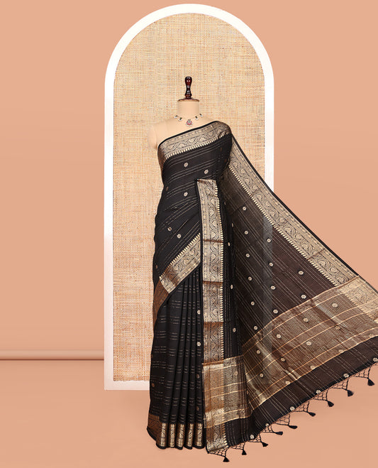 Black Assam Silk Saree, Uniquely Detailed with Zari Buttas and Stripes, Highlighted by a Zari Traditional Woven Border, Zari-Striped Pallu, and a Matching Blouse