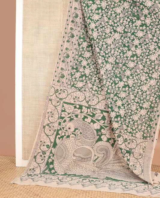 Green flora, and fauna machine printed kalamkari cotton saree, printed border, and pallu of peacock print