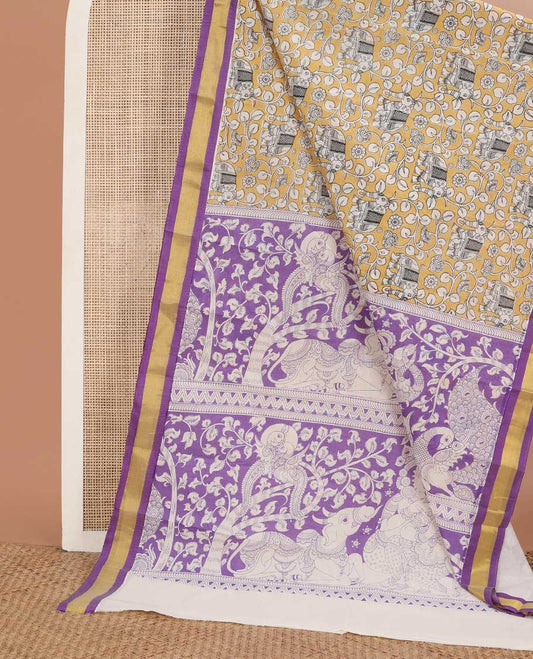 Yellow kalamkari floral vine & elephant printed chirala cotton saree, contrast zari border & pallu of floral, peacock, pichwai cow & lord figurines