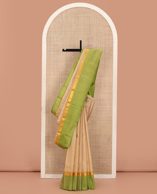 Sandal Kanchipuram Silk Saree Featuring Payadi Kattam All Over Its Body, Complemented by Contrasting Kal Earangina Border of Rekku, and Banaras Designs, Pallu of Payadi Kattam, and Paired with a Contrast Blouse