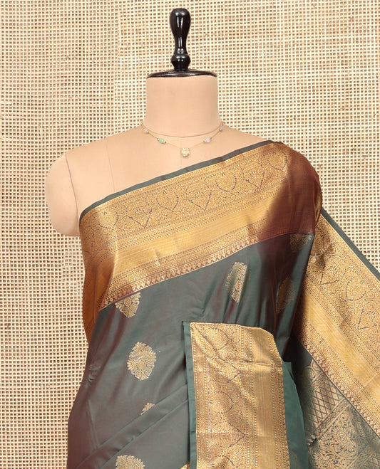 Green Budget Silk Saree, Featuring Zari Buttas, Highlighted by Traditional Zari Border, Pallu of Jaal Designs, and Matching Blouse
