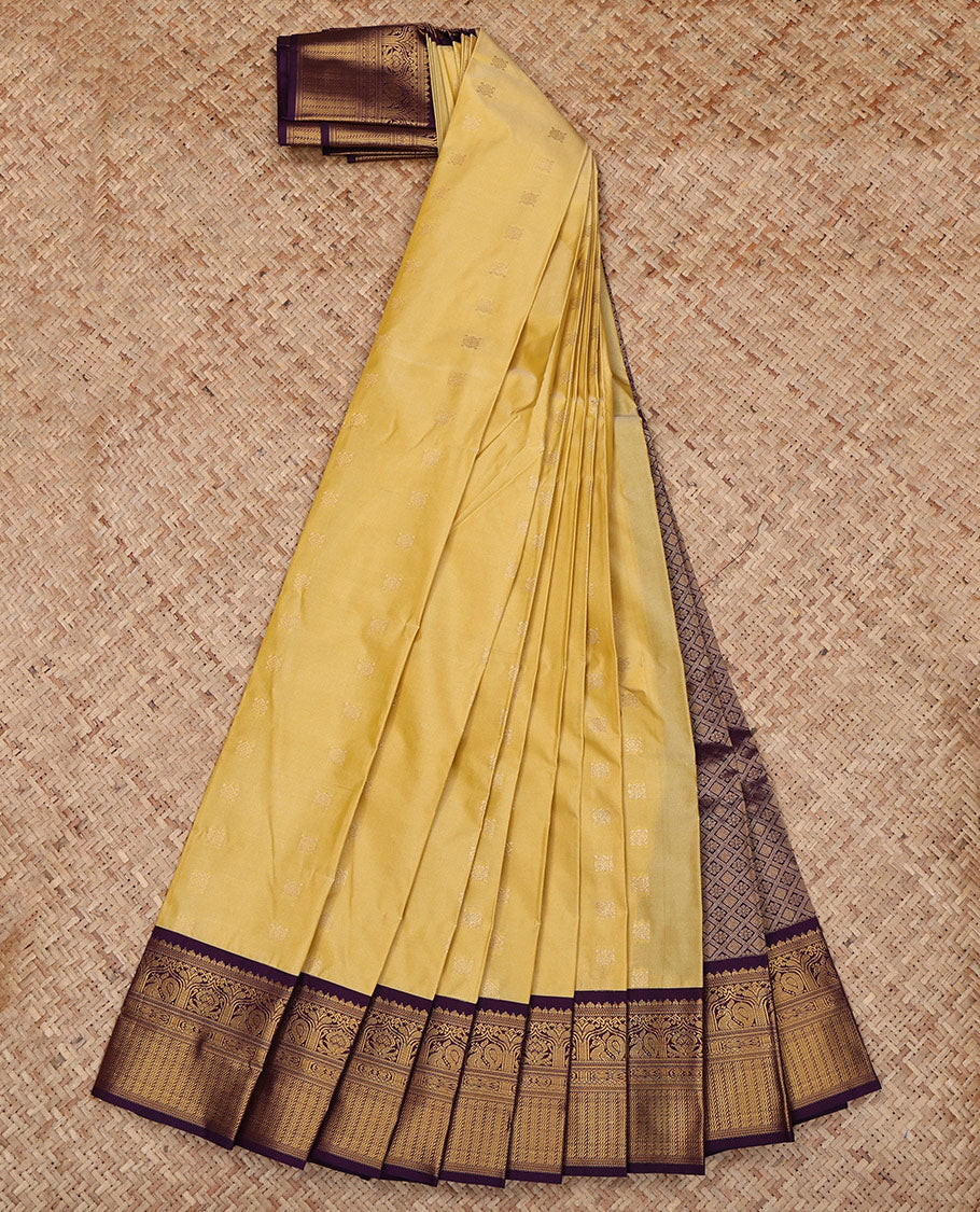 Yellow Budget Silk Saree, Sparsely Woven with Zari Buttas All Over Its Body, Complemented by a Contrast Traditional Zari Design Border, Grand Jaal Pallu, and Paired with a Contrast Blouse