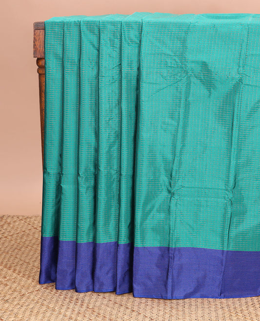 Sea green checked gift silk saree with contrast striped border & striped pallu