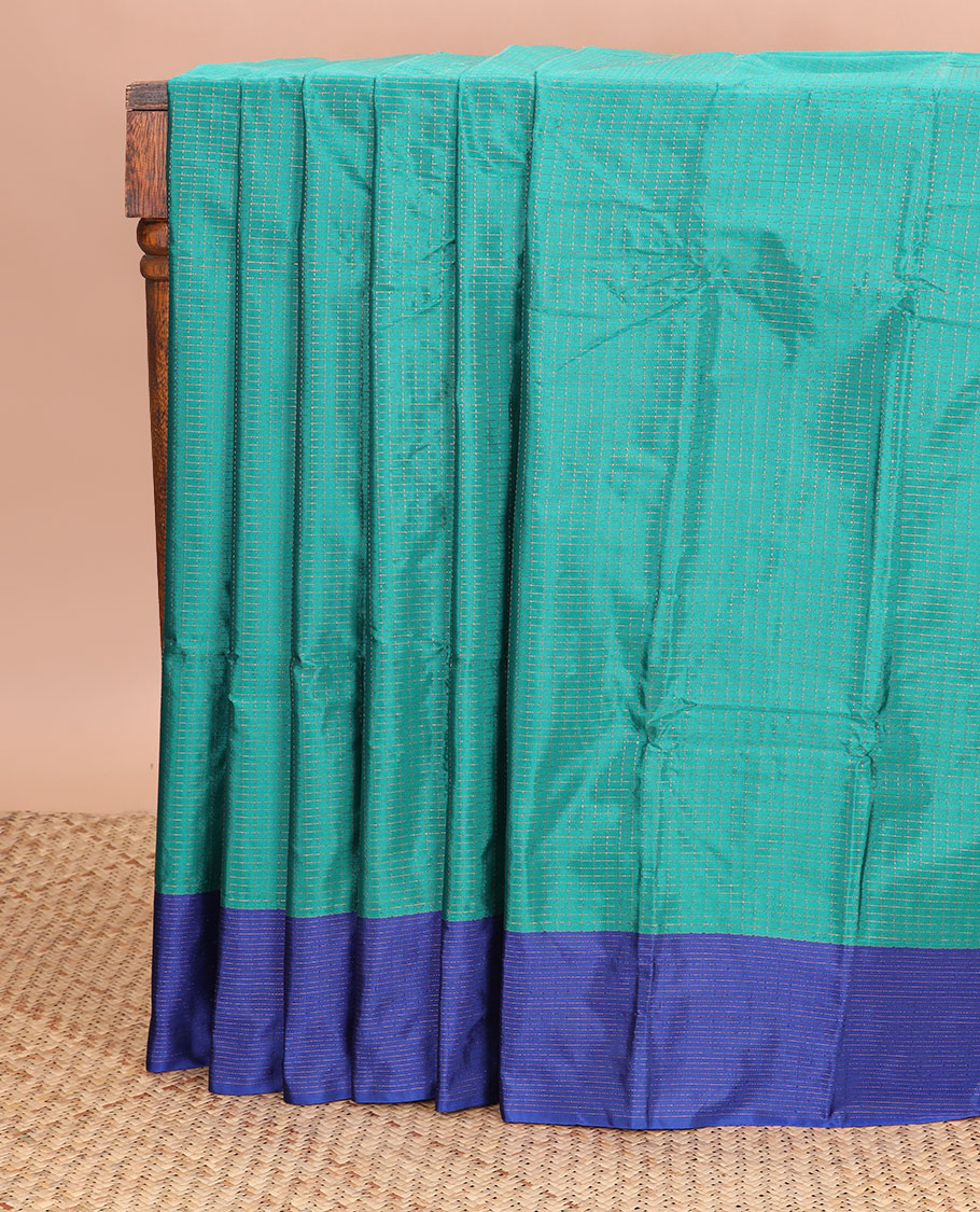Sea green checked gift silk saree with contrast striped border & striped pallu