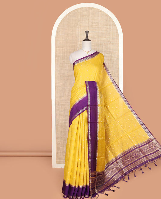 Yellow zari buttas and stripes assam silk saree, contrast traditional zari border, and zari design pallu