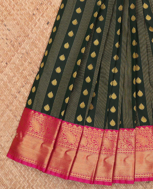 Dark Green Budget Silk Saree, Spotlighted with Zari Buttas and Stripes on Its Body, Complemented by Contrast Traditional Zari Border of Paisley Designs, Majestically Detailed Pallu, and Paired with a Contrast Blouse