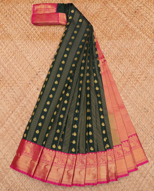 Dark Green Budget Silk Saree, Spotlighted with Zari Buttas and Stripes on Its Body, Complemented by Contrast Traditional Zari Border of Paisley Designs, Majestically Detailed Pallu, and Paired with a Contrast Blouse