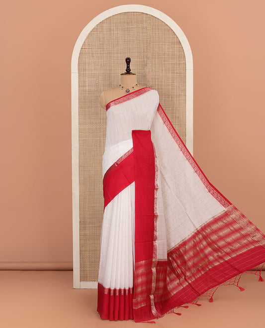 White Assam Silk Saree Sparsely Sparkled with Zari Checks, Complemented by Captivating Contrast Border Featuring Bird Designs, Gleaming Zari Striped Steeped Pallu, and Paired with a Contrast Blouse