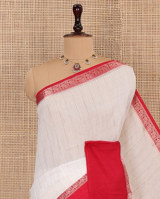 White Assam Silk Saree Sparsely Sparkled with Zari Checks, Complemented by Captivating Contrast Border Featuring Bird Designs, Gleaming Zari Striped Steeped Pallu, and Paired with a Contrast Blouse