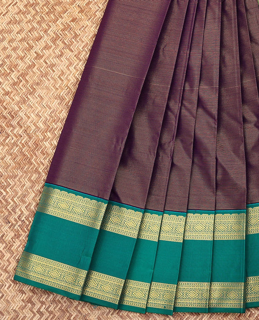 Purple Budget Silk Saree, Highlighted by Zari Stripes All Over Its Body, Complemented by a Contrast Traditional Zari Design Rettai Pettu Border, Grandly Designed Pallu, and Paired with a Contrast Blouse
