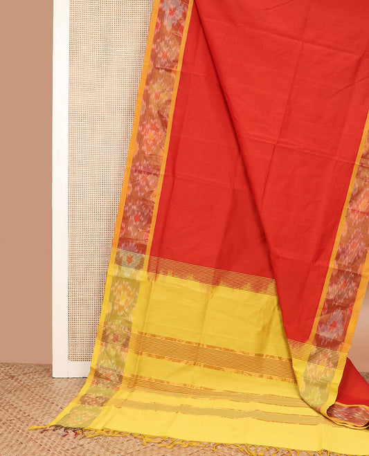 Orange plain poly cotton saree, contrast ikkat border, and striped pallu