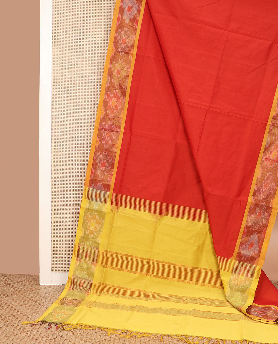 Orange plain poly cotton saree, contrast ikkat border, and striped pallu