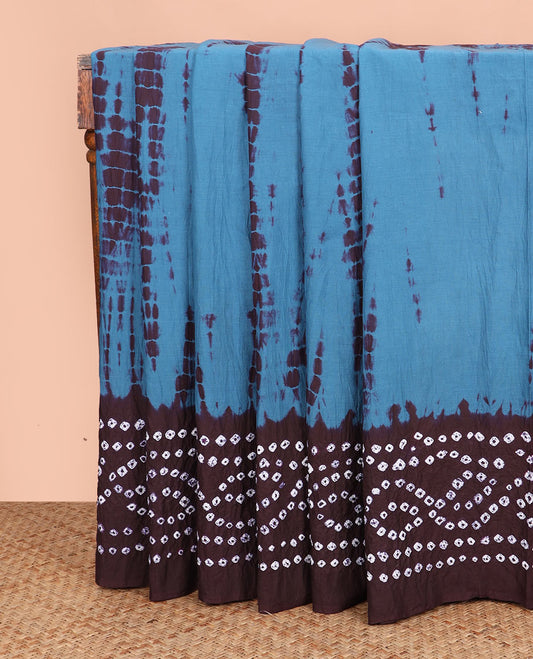 Blue shibori printed mixed cotton saree, contrast bandhani printed border, and pallu of bandhani print