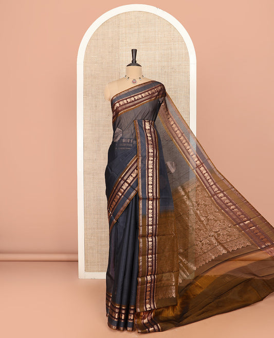 Grey Silk Cotton Saree Gleamed Up with Zari Buttas All Over the Body, Complemented by a Contrast Traditional Design Woven Varisai Pettu Border, Featuring a Pallu of Floral Jaal Designs, and Paired with a Contrast Blouse