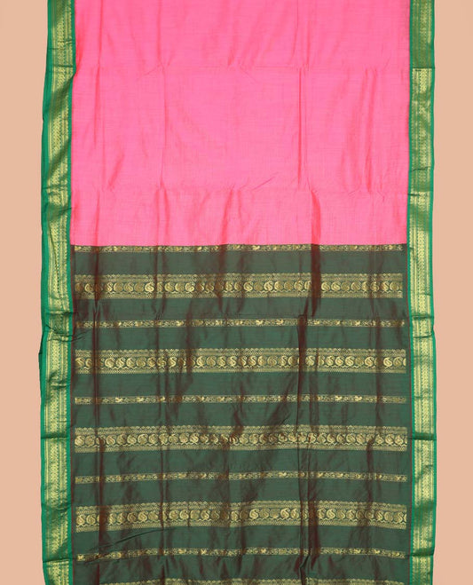 Rose milk pink striped nine-yard cotton saree, contrast zari border, and pallu steeped with traditional motifs