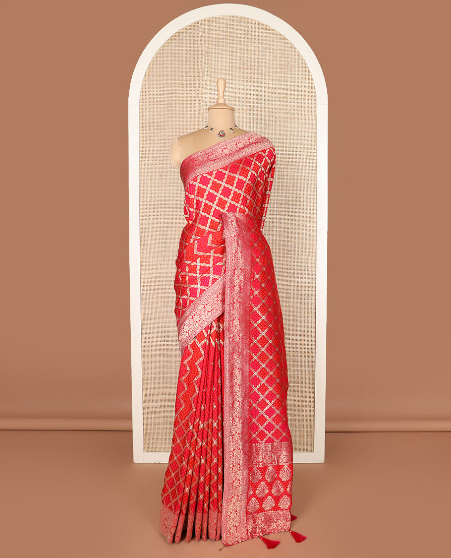 Red bandhani dottes enclosed jaal dola silk saree, traditional zari border, and pallu of intricate designs