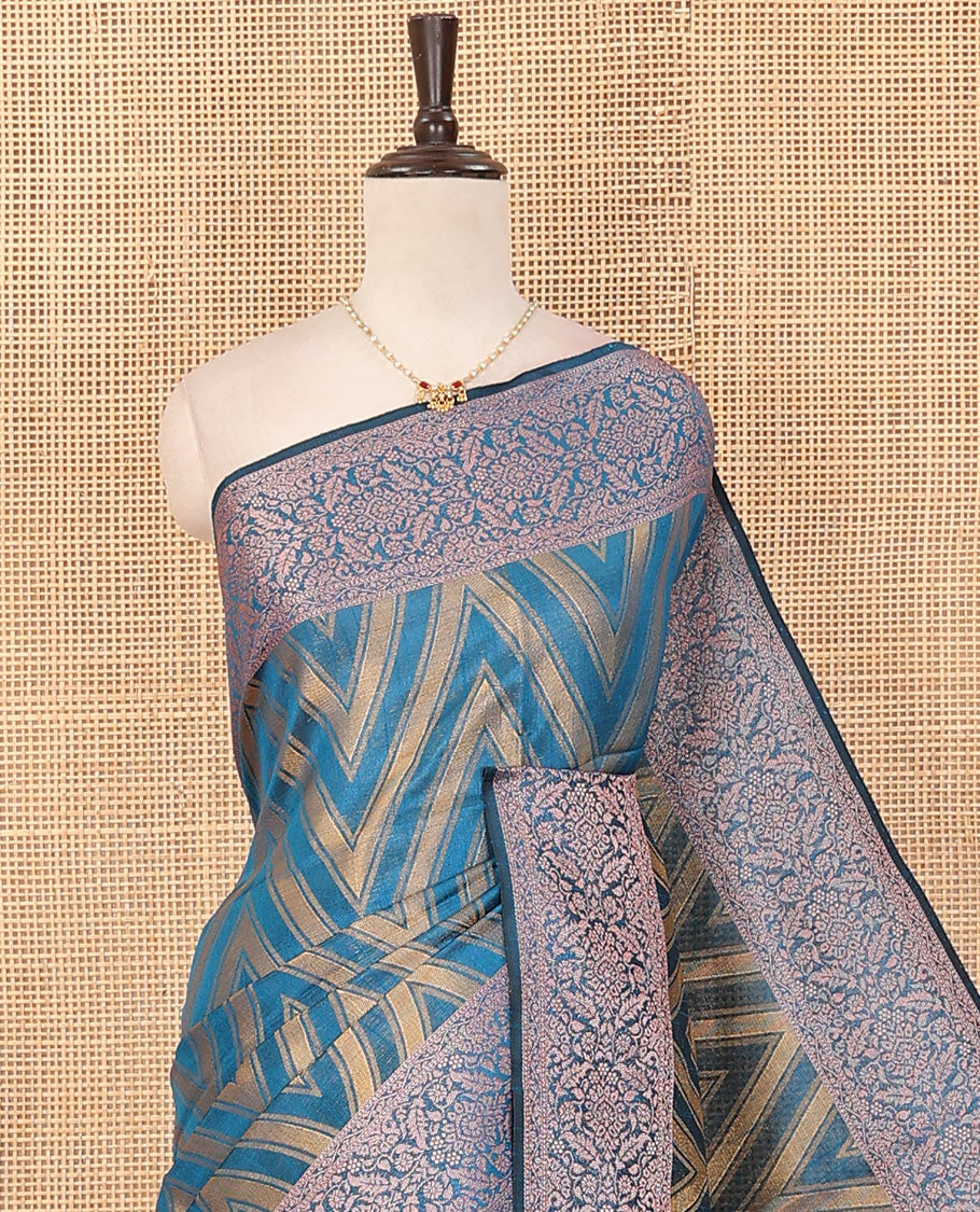 Blue chevron striped dupion saree, intricate floral design border, and thread striped pallu