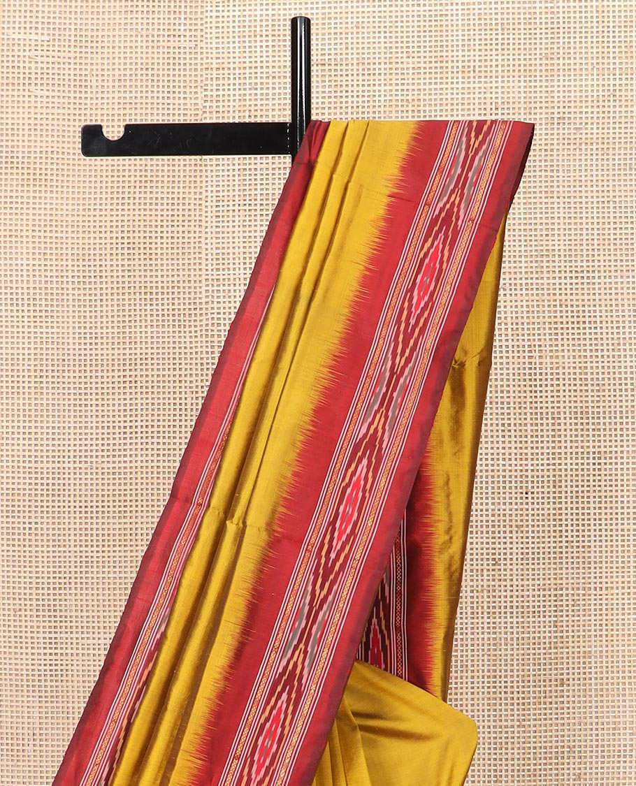 Mustard Plain Ikkat Silk Saree with a Contrast Border Enhanced by an Ikkat Weave, Pallu Features Stripes and Ikkat Texture