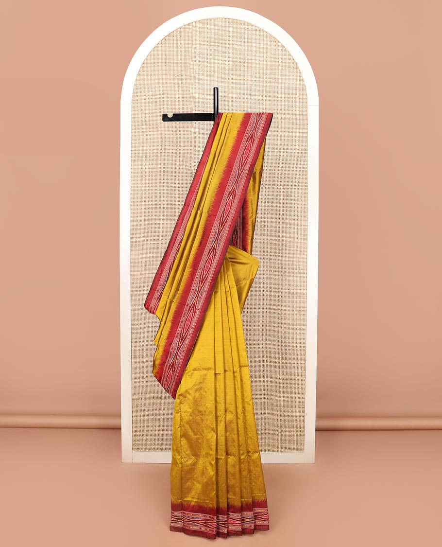 Mustard Plain Ikkat Silk Saree with a Contrast Border Enhanced by an Ikkat Weave, Pallu Features Stripes and Ikkat Texture
