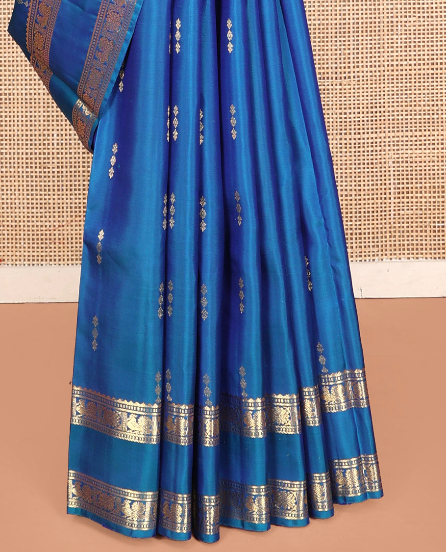 Blue Kanchipuram Silk Saree, Majestically Detailed with Zari Buttas, Highlighted by Zari Traditional Rettai Pettu Border, Grand Pallu, and Matching Blouse
