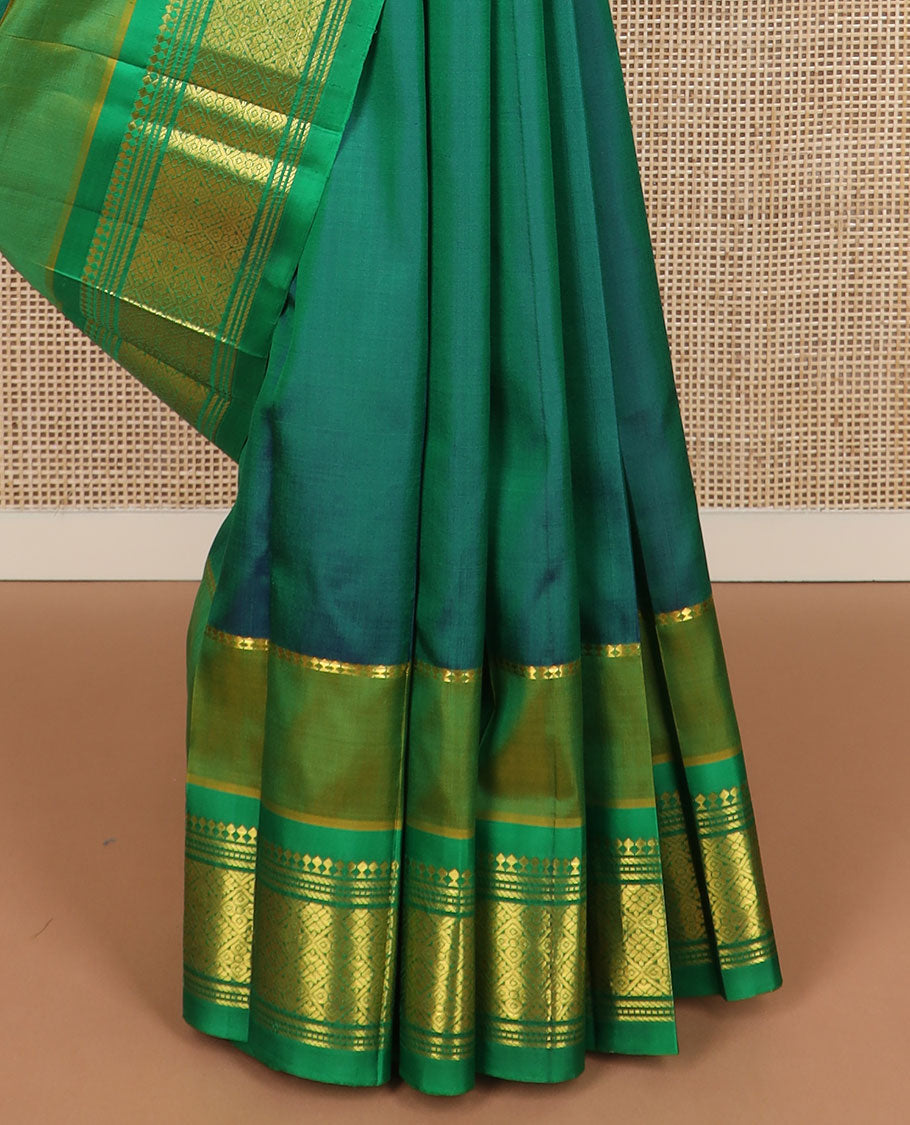 Green zari buttas Kanchipuram silk saree, contrast border of panner sombu,banaras & jaal & zari design pallu