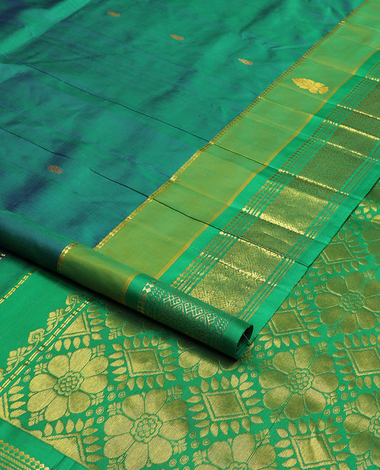 Green zari buttas Kanchipuram silk saree, contrast border of panner sombu,banaras & jaal & zari design pallu