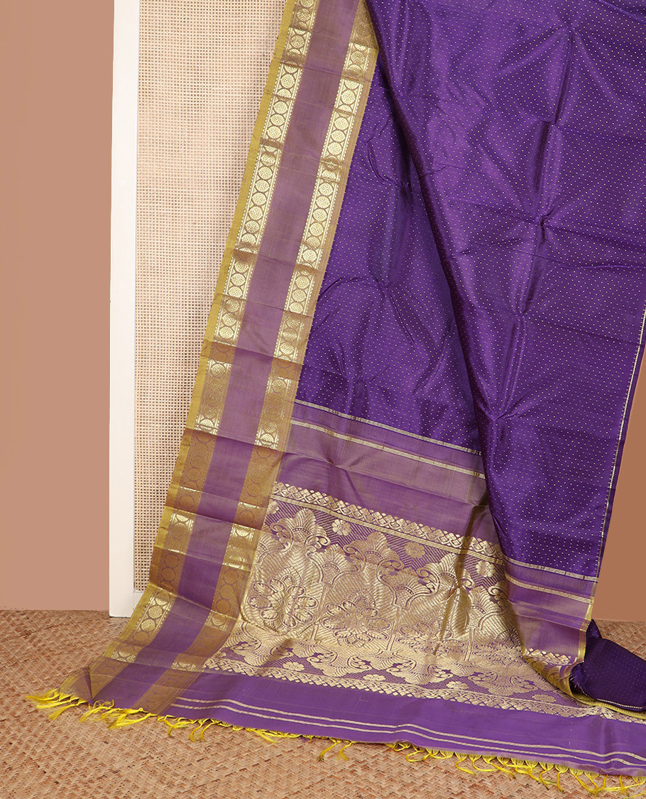 Blue zari buttas Kanchipuram silk saree, contrast one-sided rettai pettu border of rekku and poo chakram, and zari design pallu