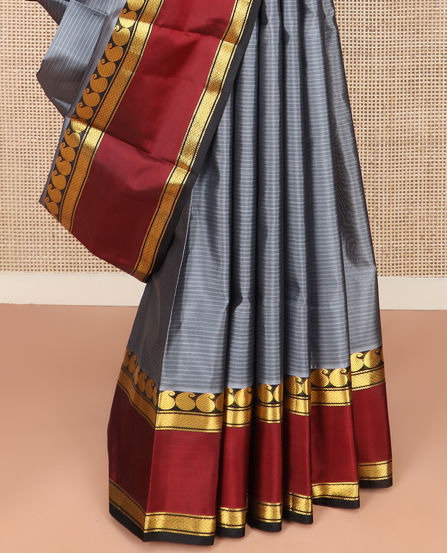 Grey Striped Kanchipuram Silk Saree Adorned with a Contrast Rettai Pettu Border Featuring Manga, Banaras, and Mayil Kann Designs, a Subtle Striped Pallu, and a Contrast Blouse