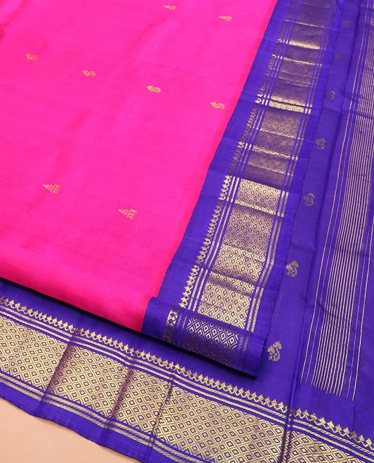Pink Kanchipuram Silk Saree, Mesmerized with Zari Buttas All Over Its Body, Complemented by a Contrast One-Sided Korvai Border of Salngai, Banaras, and Jaal Designs, Pallu of Zari Designs, and Comes Without a Blouse
