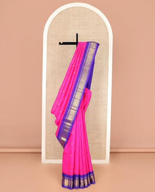 Pink Kanchipuram Silk Saree, Mesmerized with Zari Buttas All Over Its Body, Complemented by a Contrast One-Sided Korvai Border of Salngai, Banaras, and Jaal Designs, Pallu of Zari Designs, and Comes Without a Blouse