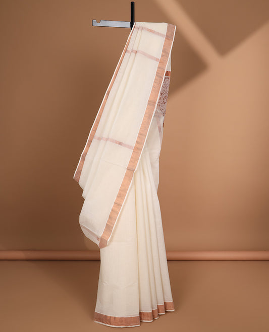 Cream kerala saree with zari designs, plain border & pallu of intricate zari designs