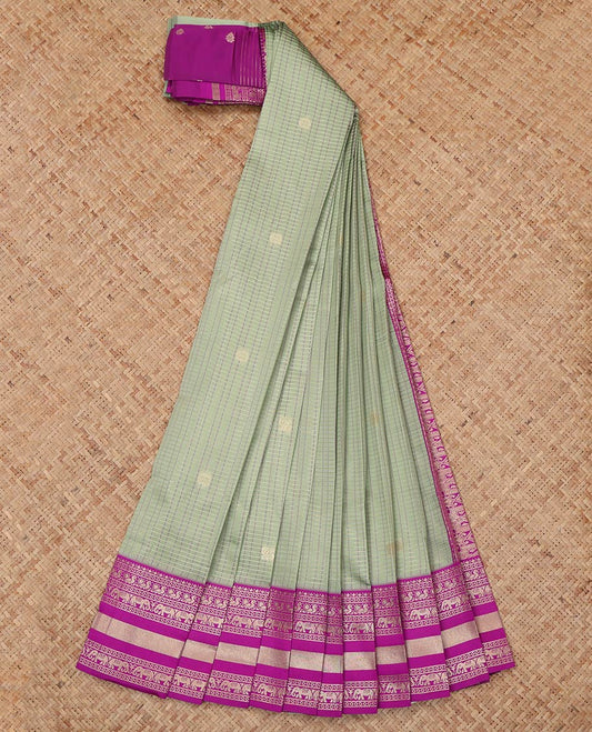 Green Litchi Saree, Crafted with Peacock-Chakram Buttas and Checks, a Contrast Traditional Zari Border, Intricate Pallu, and a Contrast Blouse