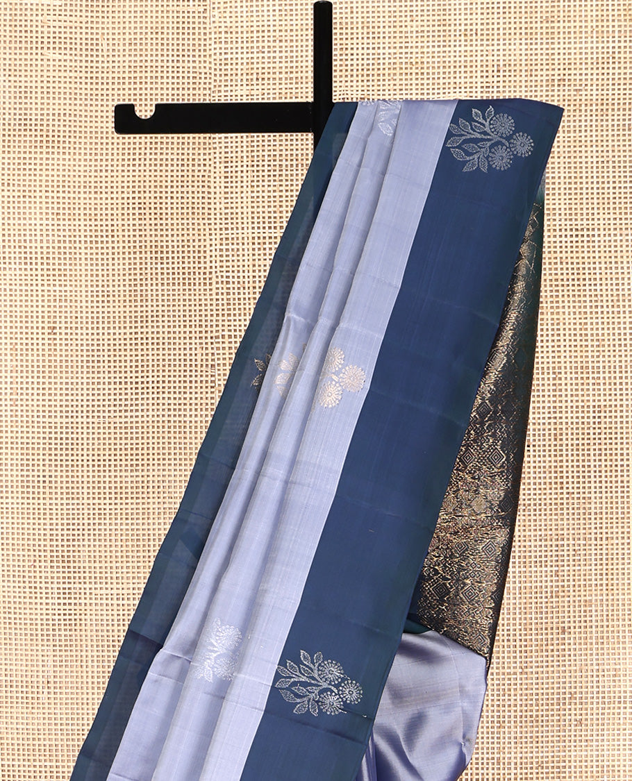 Grey Mayuri Lite Silk Mix Saree, Sparsely Woven with Zari Buttas All Over Its Body, Complemented by a Contrast Border of Floral Designs, Pallu of Jaal Designs, and Paired with a Contrast Blouse