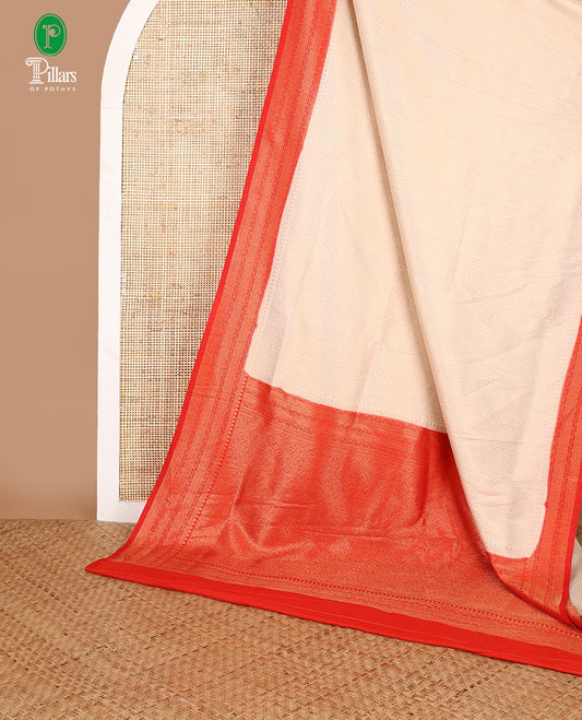 Cream with red zari weaving banaras softy saree with jacquard border & rich weaving pallu along with brocade blouse